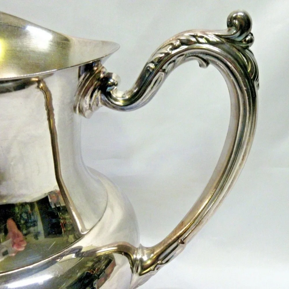 Antique Oneida Silverplate Water Pitcher w/ Ice Lip 4 Legs 8